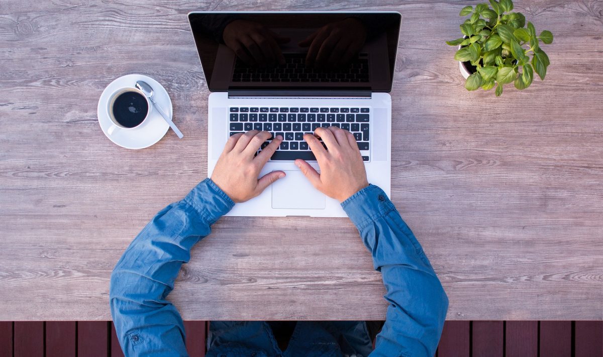 man working at laptop