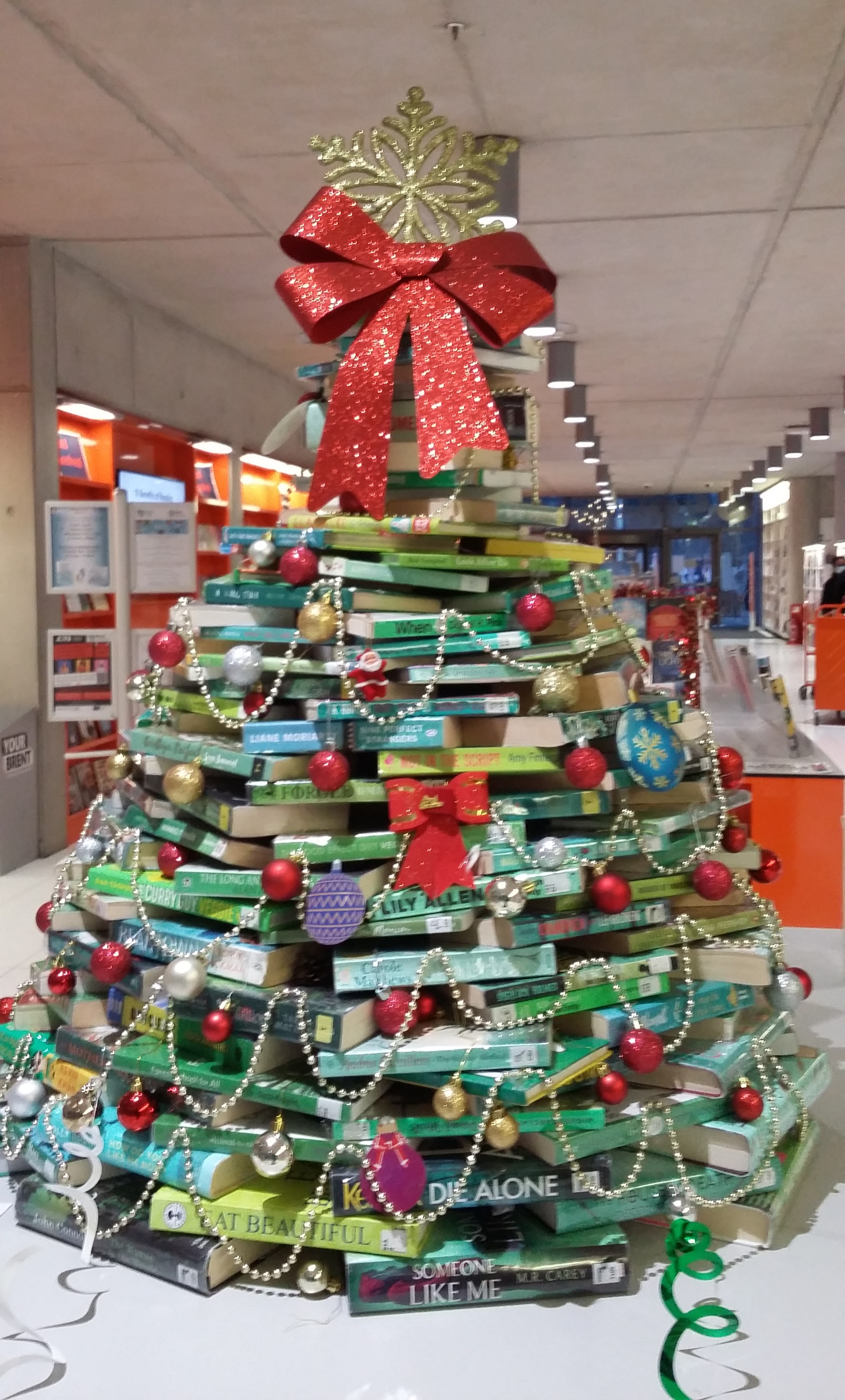 a christmas tree made of books